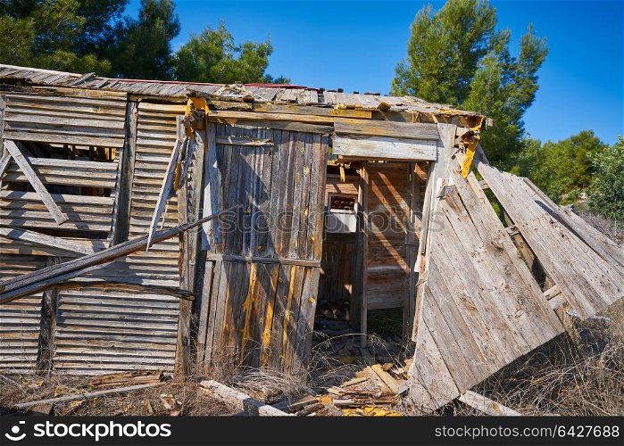 Old wooden cabin house destroyed by hurricane and abandoned
