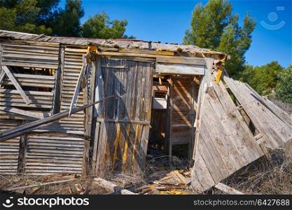 Old wooden cabin house destroyed by hurricane and abandoned