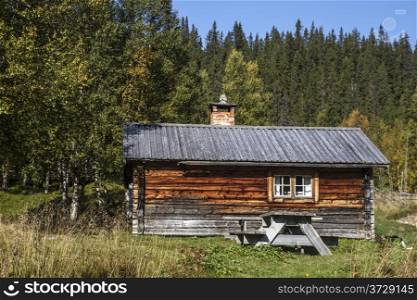 Old wooden cabin in mountain