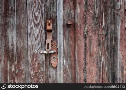 old wooden door and doorknobs