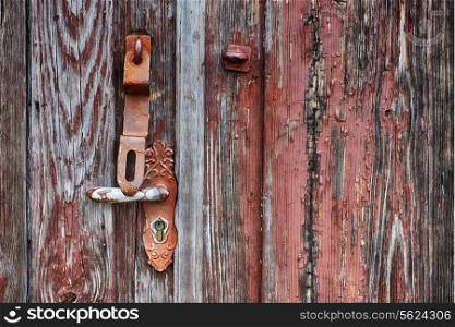 old wooden door and doorknobs