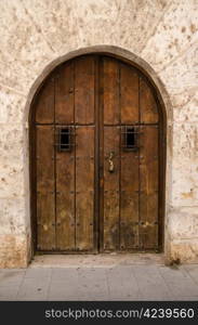 Old wooden door from medieval era.