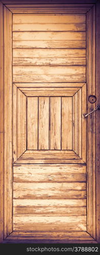 Old wooden door with handle