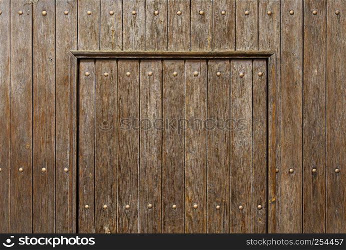 Old wooden door with lock, detail of security and protection, antiquity