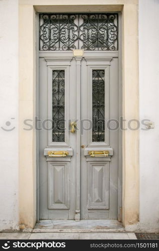 Old wooden doors, metal handles. Cose-up Castle. Old wooden doors, metal handles