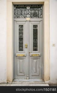 Old wooden doors, metal handles. Cose-up Castle. Old wooden doors, metal handles