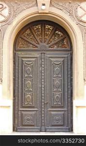 Old wooden entrance door in a house