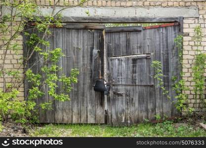 Old wooden gate in the barn