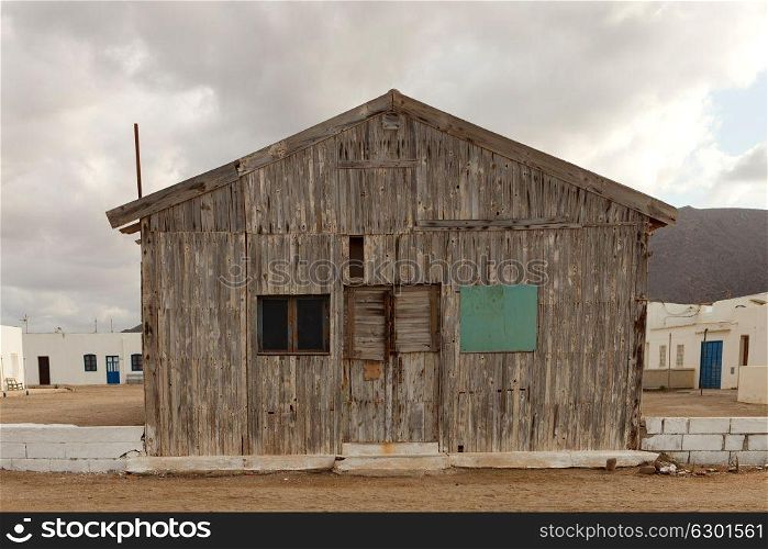 Old wooden house for fishermen with three windows