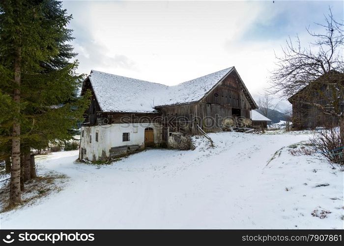 Old wooden house in forest at Austrian Alps