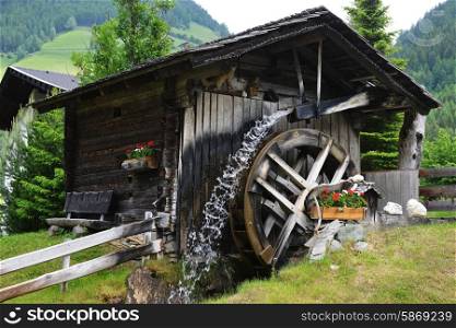 old wooden mill in mountains. mountain landscape