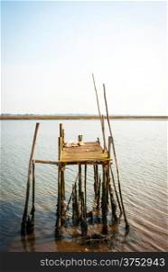 Old wooden piers toward the water
