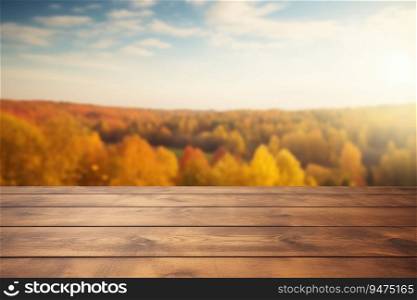 Old wooden table for product display with natural autumn landscape background.