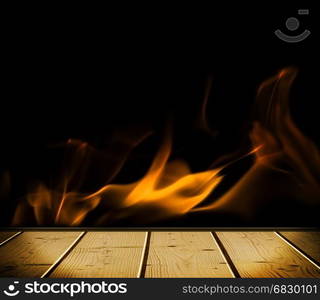 Old wooden table in front of the fireplace.. old plaster