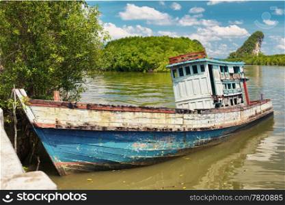 old wooden thai ship in Krabi, Thailand