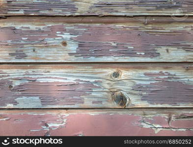 Old wooden wall, painted a long time ago
