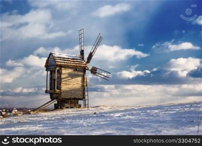 Old wooden windmills at Pirogovo ethnographic museum, near Kiev, Ukraine
