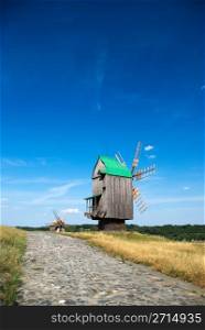 Old wooden windmills at Pirogovo ethnographic museum, near Kyiv, Ukraine