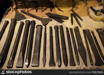 Old Woodworking tools arranged on background.. Old Woodworking tools arranged on background at the fair in Spain.