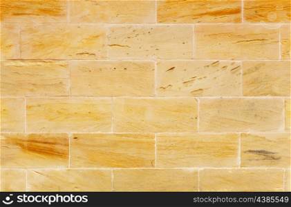 old yellow stone wall texture