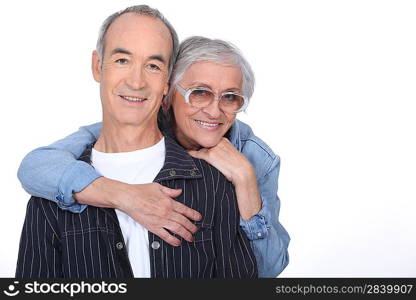 Older couple hugging