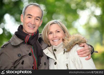 Older couple on an autumnal walk