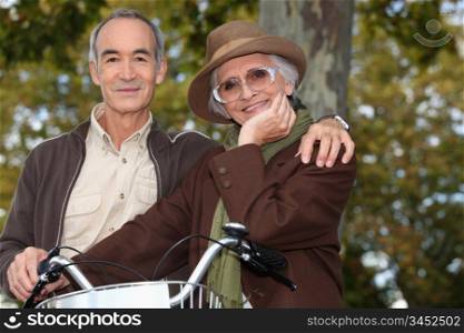 Older couple with a bicycle