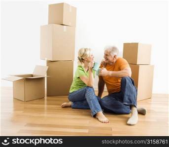 Older couple with boxes