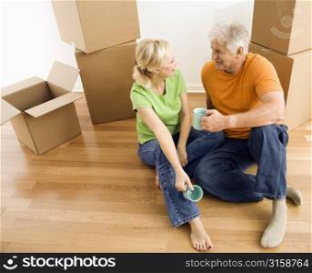 Older couple with boxes