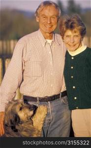 Older Couple with Dog