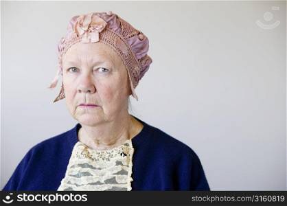 Older lady in pink hat
