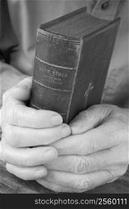 Older Man Holding Bible