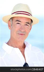 Older man in a straw panama hat