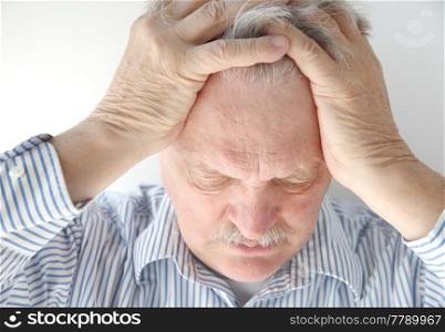 Older man is overwhelmed and feeling pressure.
