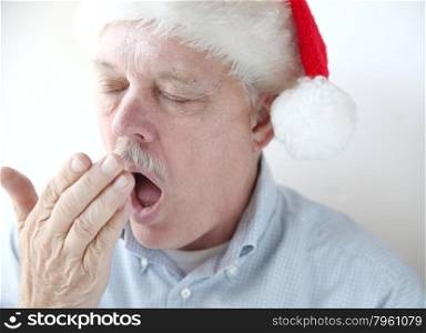 older man is tired from Christmas activities