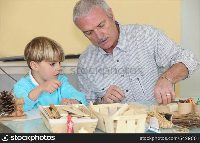 Older man spending time with his grandson