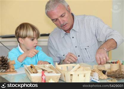 Older man spending time with his grandson