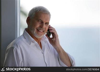 Older man with a telephone