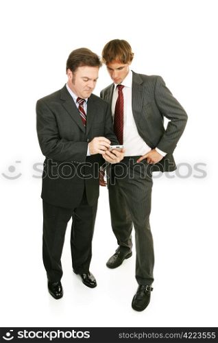 Older professional mentoring young businessman. Full body isolated on white.