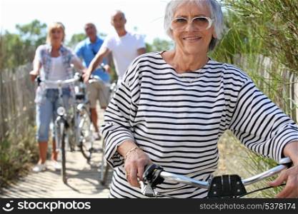 Older woman and friends on a bike ride