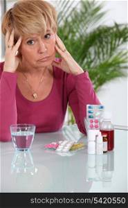 Older woman concerned about her pills