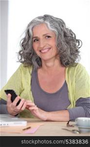 Older woman using a cellphone