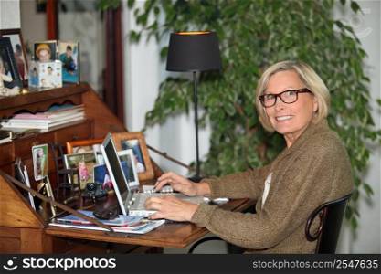 Older woman using a laptop