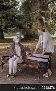 older woman with medical mask woman nursing home