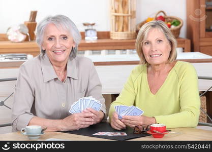 Older women playing cards