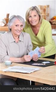 Older women playing cards