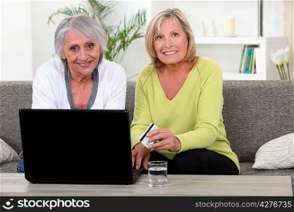 Older women using a credit card online