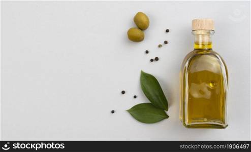 olive oil bottle with leaves olives table. High resolution photo. olive oil bottle with leaves olives table. High quality photo
