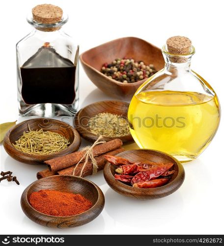 Olive Oil,Vinegar And Spices On White Background