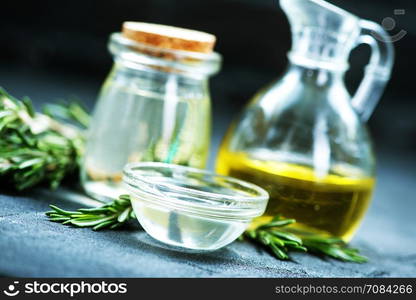 olive oil with rosemary, oil in bottle